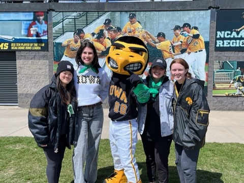 Herky wearing a green bandanna