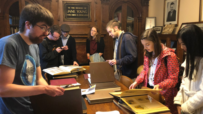 Students researching in a library